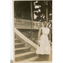 Nurse Dorothy Hayward, on the steps of the Jubilee Building, Ipswich Hospital, Ipswich, 1940s