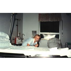 MIDWIFERY Scrapbook 1991 TO 1998, Nurse with mask at bed 1993