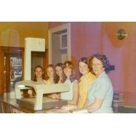 Staff of the Ipswich Municipal Library, when located on the corner of Brisbane and Nicholas Streets, Ipswich, 1970s