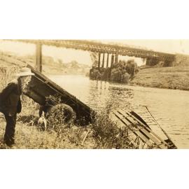 Luya Julius (truck) in the Bremer River at Nicholas Street, Ipswich, c.1935