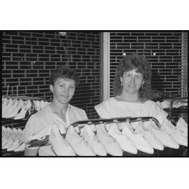 Unidentified women believed to be staff members at Redbank Plaza Shopping Centre Vic Jensens Family Shoe Store during the grand opening, Redbank, September 1985