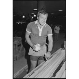 Unidentified workman painting in Redbank Plaza Shopping Centre during construction, Redbank, September 1985