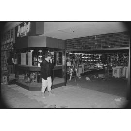 Unidentified woman outside Redbank Plaza Shopping Centre Amies Jewellers during construction, Redbank, September 1985