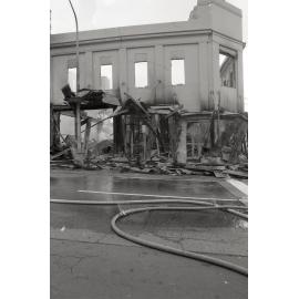 Aftermath of the Reid's (Cribb & Foote) fire, Brisbane Street, Ipswich, August 1985