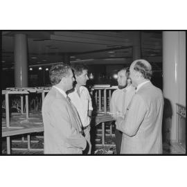 Unidentified group of men in the food court of Redbank Plaza Shopping Centre, Redbank, September 1985