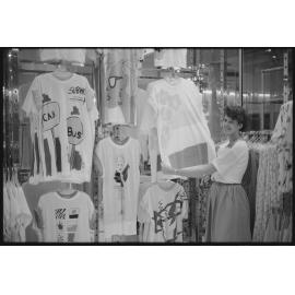 Unidentified staff member at Redbank Plaza Shopping Centre during the grand opening, Redbank, September 1985