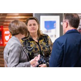 Mayor Teresa Harding speaking with attendees at the Ipswich Art Awards, 2023