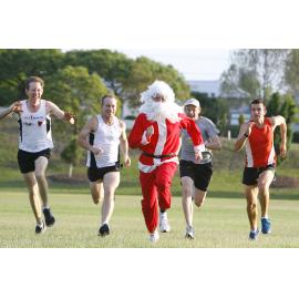 Team Ultimate Fitness (TUF) running group members in training for their annual Santa Run, Limestone Park, Ipswich, December 2011