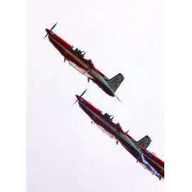 RAAF Roulettes performing aerobatic displays for Ipswich State High School students, Brassall, Ipswich, October 2011