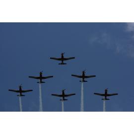 RAAF Roulettes performing aerobatic displays for Ipswich State High School students, Brassall, Ipswich, October 2011