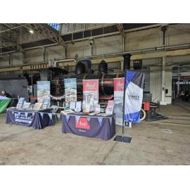 Picture Ipswich and Ipswich Heritage Program tables at the Steam, Smoke & BBQ event for Galvanized, The Workshops Rail Museum, North Ipswich, September 2025