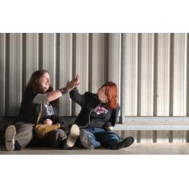 Jessie MacDonald and Erin Chilcott, and Trent Chandler, Corey Davies and Mitchell Mansfield discussing the talent at the 2004 Ipswich Battle of the Bands, Ipswich, July 2004