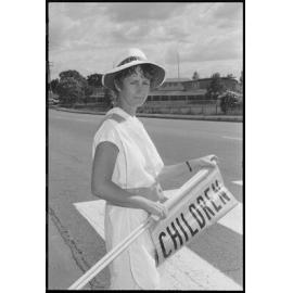 Unidentified lolly pop lady, first day of school, Ipswich, January 1986