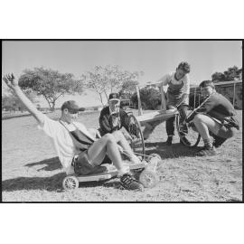 Unidentified teenage boys building go-carts, location unknown, 1st August 1994 