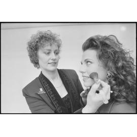 Grace Cosmetics make-up artist with unidentified client, location unknown, 1st August 1994