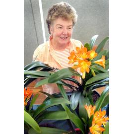 Coral Larsen with hybrid Clivia plants at the Glebe Rd Home Gardener's Expo, Ipswich, August 2004 