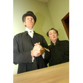 Paul Fyfe as "Mr Sowerberry" (the undertaker) and Susan Glosko as "Mrs Sowerberry" as part of the cast in the Oliver Musical, Ipswich, August 2004 