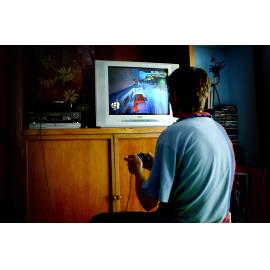 Man playing video games on TV, Ipswich, January 2005