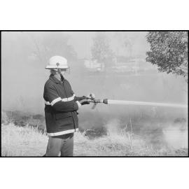 Firefighter at a grass fire, location unknown, 3rd August 1994