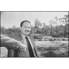 Unidentified business man at a construction site, location unknown, 3rd August 1994