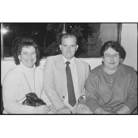 Unidentified group sitting in the foyer of the Ipswich Civic Centre, Ipswich, August 1994
