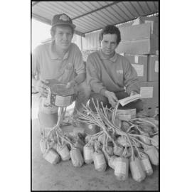 Two unidentified men from Australian Pyrotechnic Displays with fireworks, location unknown, 5th August 1994