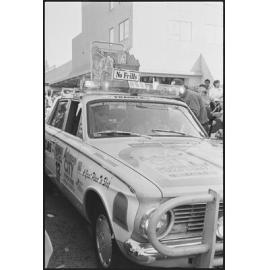 Entrant in the Variety Bash drives down Brisbane Street, Ipswich, 5th August 1994