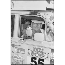 Unidentified man driving one of the vehicle entrants in the Variety Bash, Brisbane Street, Ipswich, 5th August 1994