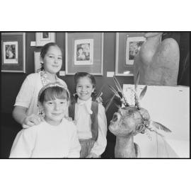 Three unidentified girls in an art exhibition at Centrepoint Boulevarde, Ipswich, Queensland, 9th August 1994