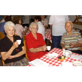 Ipswich Red Cross members Audrey Nutley, Nancy Ward and Ken Schneider at their morning tea in aid of the Asian tsunami victims, Ipswich, 12th January 2005