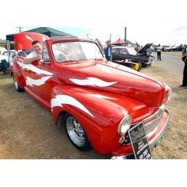 Jeff Crone of Peak Crossing, with his 'Grease Lightning' car, a 1947 Ford Convertible (with a 350 Chev and Turbo) at the Just Rock Ipswich 'back to '63' rock 'n' roll spectacular car show, Ipswich, July 2004 