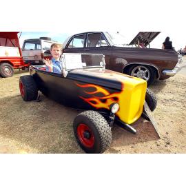 Johnathan Crone of Peak Crossing, in his very own 1932  1/2 (half) Scale Ford Roadster at the Just Rock Ipswich 'back to '63' rock 'n' roll spectacular car show, Ipswich, July 2004