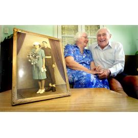 Stamp collector George Bould with one of the new Australia Post parrot stamps, Ipswich, 17th February 2005