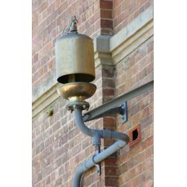 Whistle on side of a building at the Railway Workshops, North Ipswich, September 2004