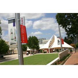 Ipswich Art Gallery signage, featuring McMahon's bottles, in d'Arcy Doyle Place, Ipswich, February 2006