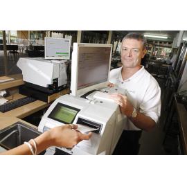 Brett Kitching from the Ipswich Turf Club with the new TAB machines which are the first in Queensland, Ipswich, 6th January 2011 