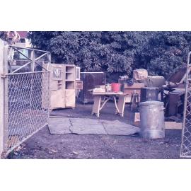 Flood damaged furniture stacked outside a house, 2nd February 1974