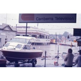 Flood waters inundating the corner of Brisbane and East Streets, Ipswich, Sunday morning, 27th January 1974
