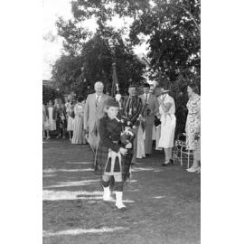Unidentified bagpipe player playing at the the memorial in honour of Mary Aileen Bell, Coochin Coochin, Scenic Rim, April 1980
