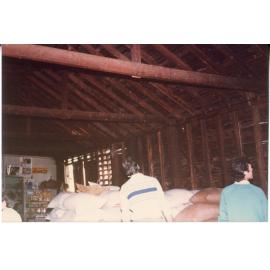 Wide timber boards and bags of stock inside Risson's Produce