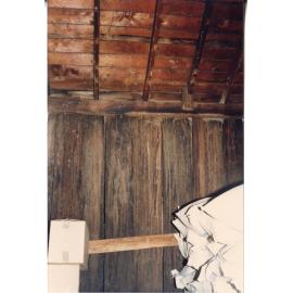 Wide timber boards and bags of stock in Risson's Produce