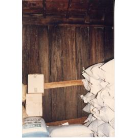 Wide timber boards and bags of stock in Risson's Produce