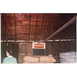 Wide timber boards and bags of stock inside Risson's Produce