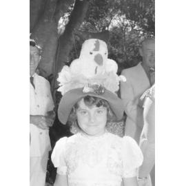 Unidentified girl in chicken bonnet at the memorial in honour of Mary Aileen Bell, Coochin Coochin, Scenic Rim, April 1980