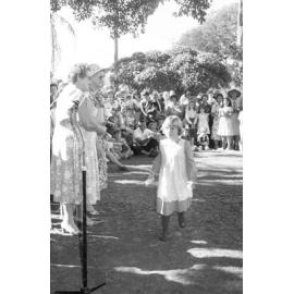 Unidentified girl in a pinafore at the memorial in honour of Mary Aileen Bell, Coochin Coochin, Scenic Rim, April 1980
