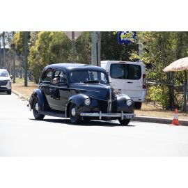 Vintage cars driving along Queen Street, during the Marburg Meander, event held as part of Galvanized: A Festival of Heritage, Marburg, Ipswich, September 2026