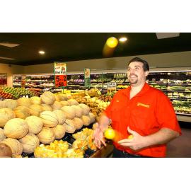 Rob Sayle juggles his inventory at the Yamanto outlet of Harvest Market, Ipswich, 2 February 2005