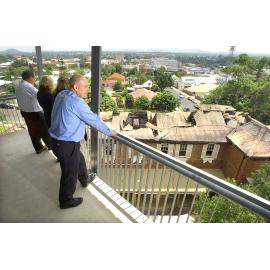 Manager of  Ipswich Hospital Business Services, Ray Chandler, looks over the charred remains of his heritage listed office, Ipswich, 7 February 2005 