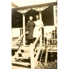 Susan and Julia O'Connell on the veranda of their Bergin's Hill, Bundamba, Ipswich, home, 1940s