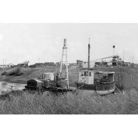 Truck with crane on back beside the Bremer (boat), Ipswich,1940s